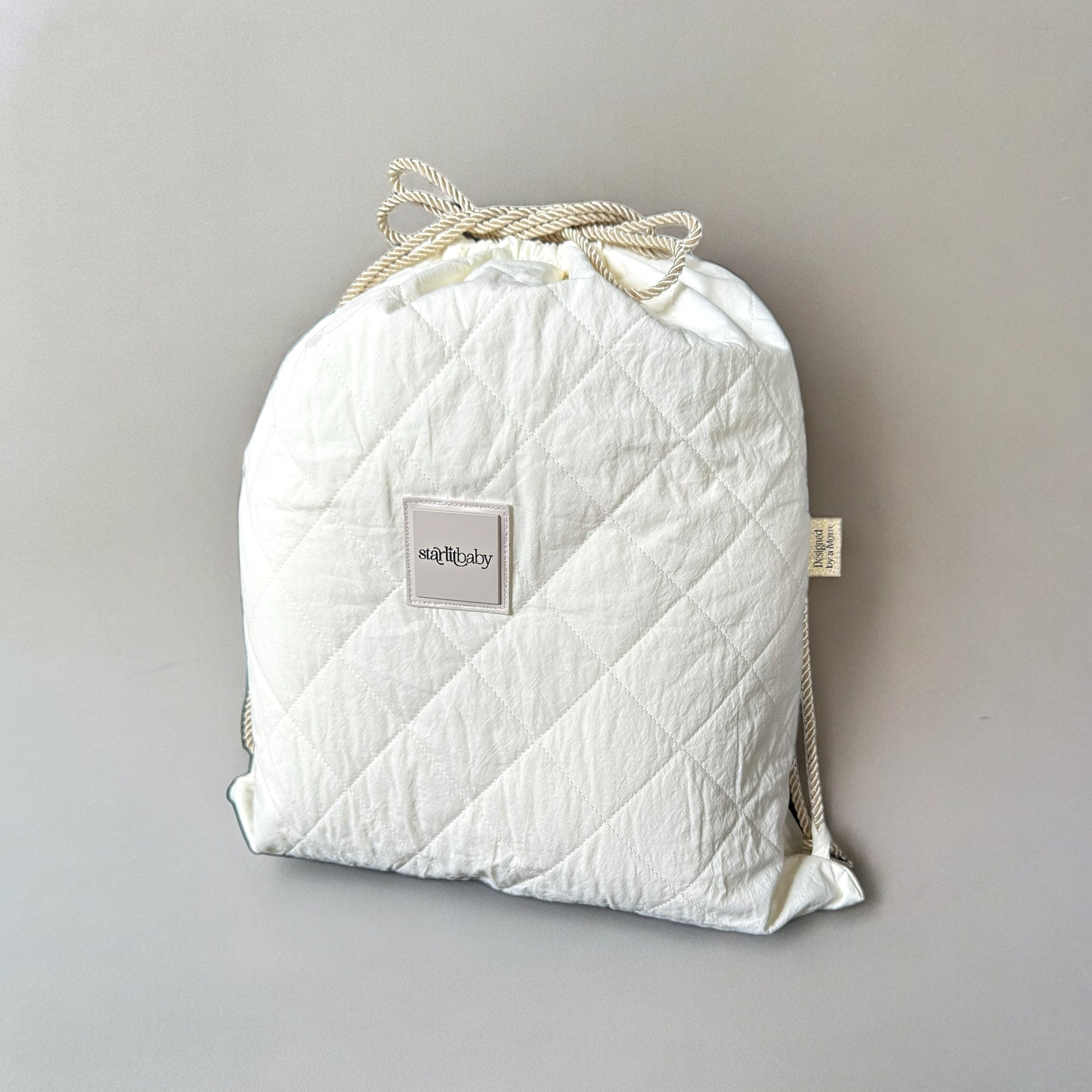 MOCHILA Starlitbaby de tacto suave y delicado con textura acolchada