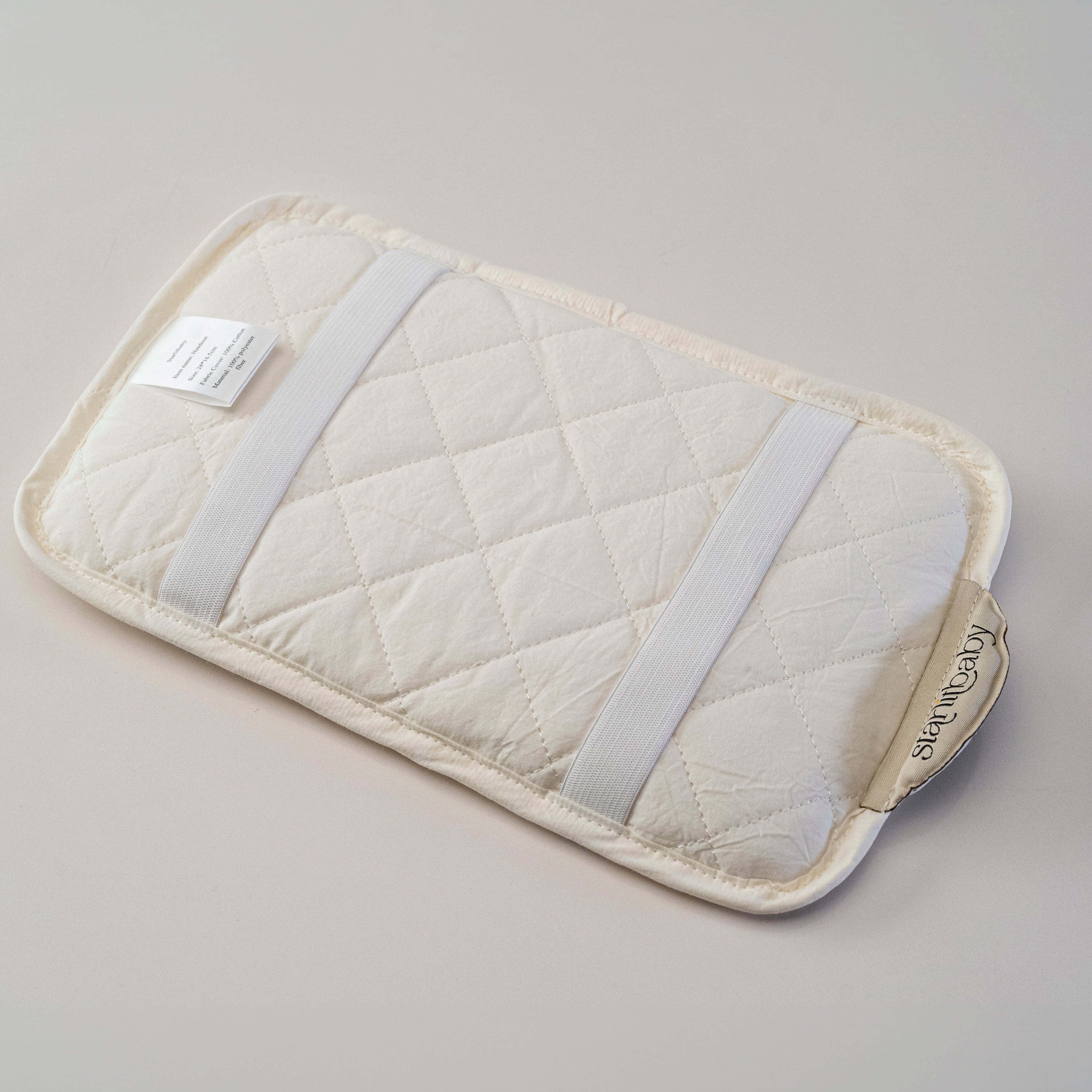 Elastic straps for securing the Headrest Cushion to your arm during breastfeeding