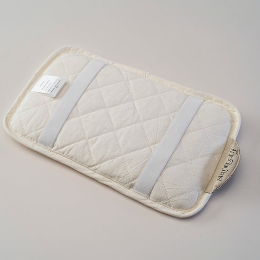 COJÍN HEADREST Cojín de lactancia . Elásticos de sujeción al brazo de la mamá